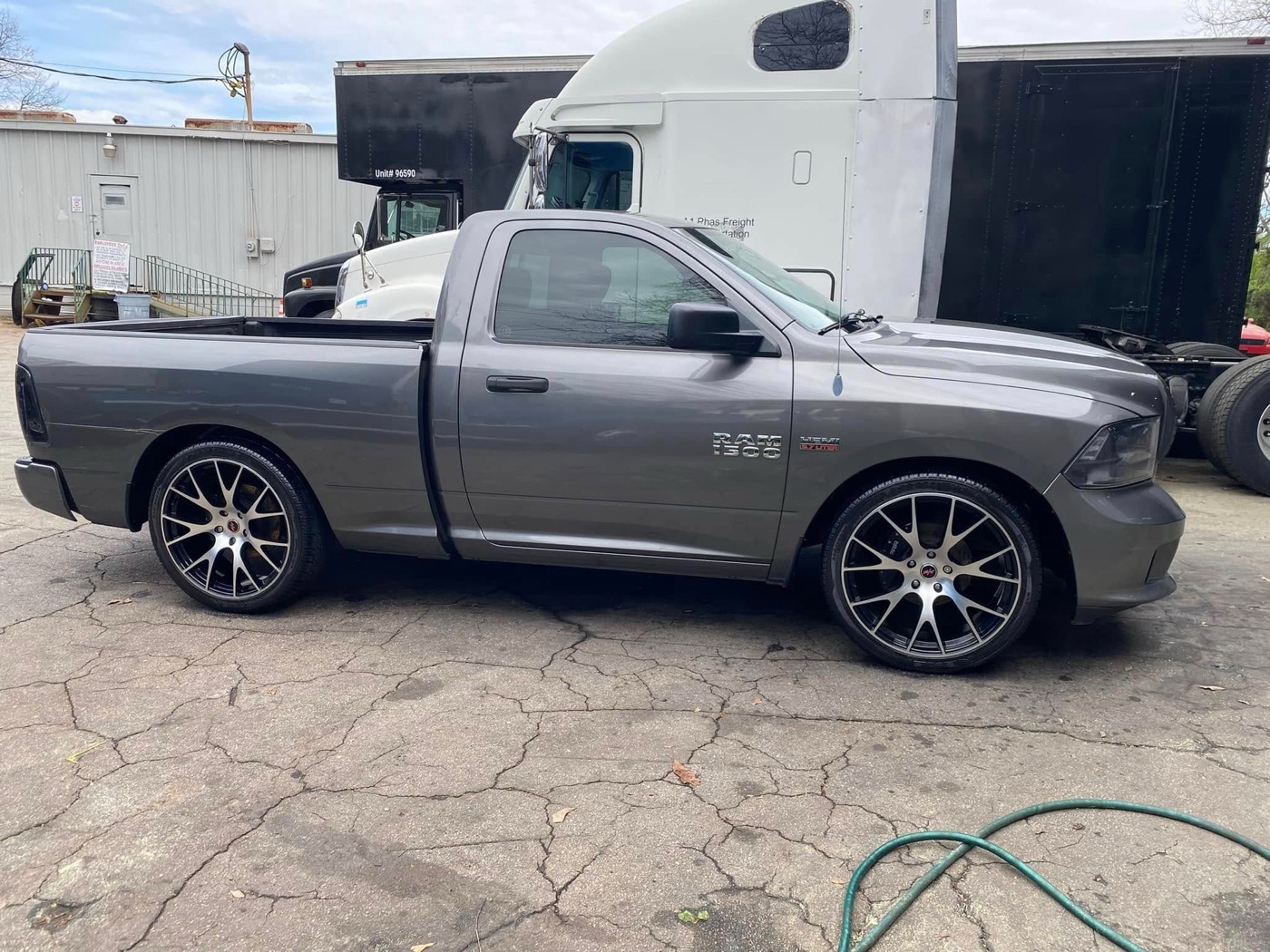 Mobile detailing job on site next to a semi truck