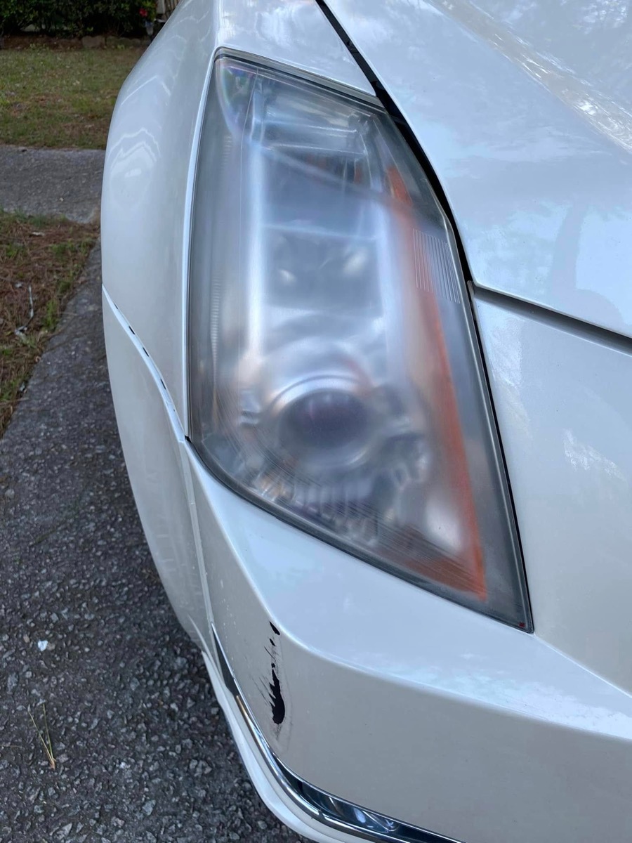 Cloudy, yellowed headlight before restoration